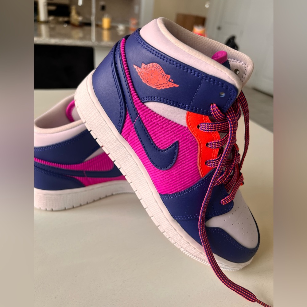 Youth Air Jordan 1 Mid “Fire Pink” tennis shoes. Size 5Y